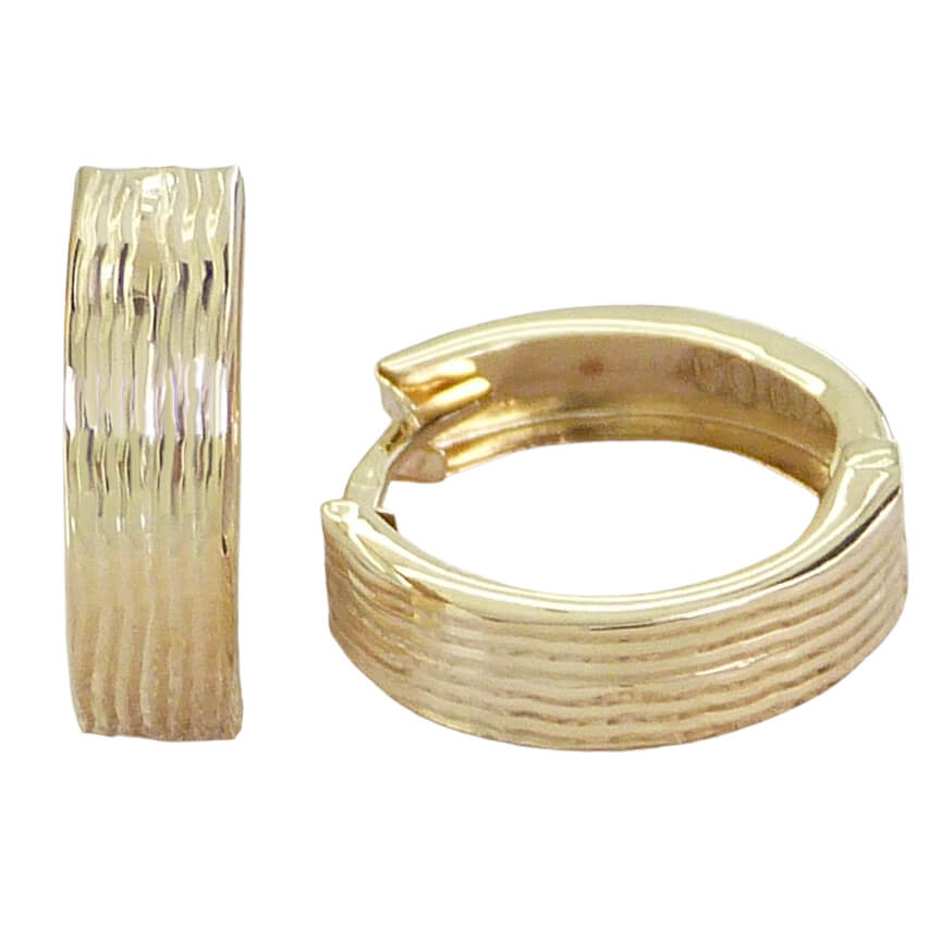 Aros huggies gallón tallado oro 18k