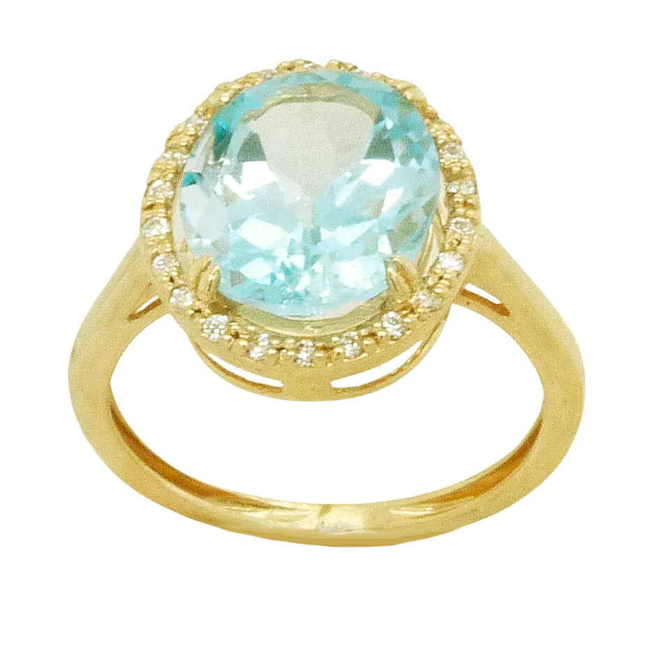 Anillo topacio azul oval y circonitas oro 18k