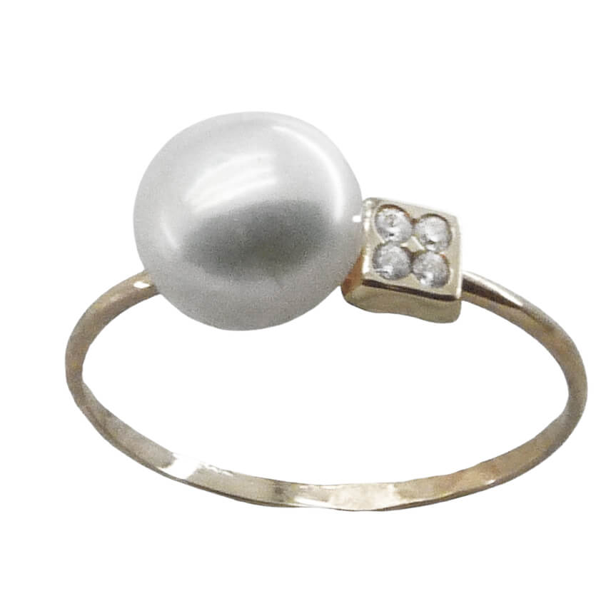 Anillo comunion con perla de 7/8mm.en oro blanco 18k
