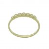 Anillo en brillo espejo con siete circonitas oro 18k