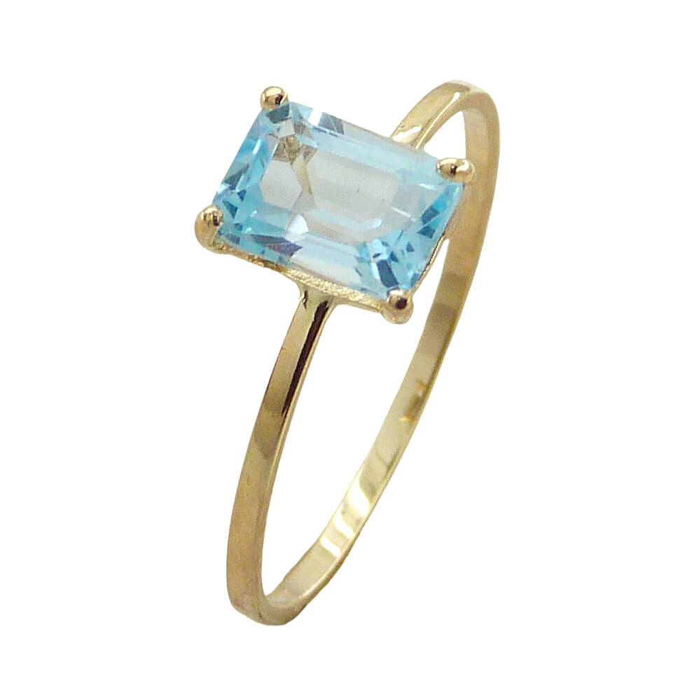 Anillo brillo con piedra color "skyp blue" oro 18k