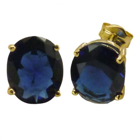 Pendientes garras con piedra color zafiro oval oro 18k