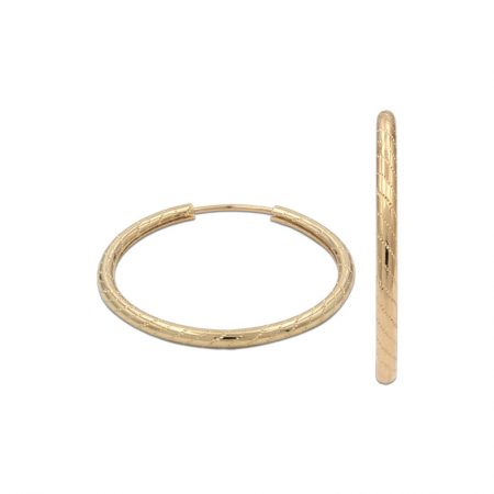 Aros tubo tallados 15mm. oro 18k