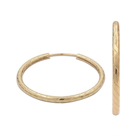 Aros tubo tallados 20mm. oro 18k