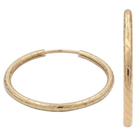 Aros tubo tallado 25mm. oro 18k