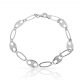 Pulsera eslbon y calabrote plano en oro blanco de 18k