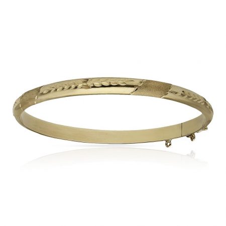 Pulsera media caña tallada de 5mm. oro de 18k