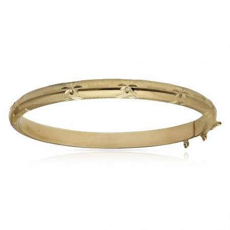 Pulsera media caña tallada de 6mm.en oro de 18k