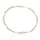 Tobillera bicolor en oro de 18k