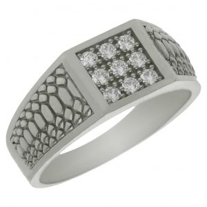 Solitario tallado brillo y mate 9 circonitas oro blanco 18k