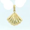 Colgante concha compostelana de 14x13mm.en oro de 18k